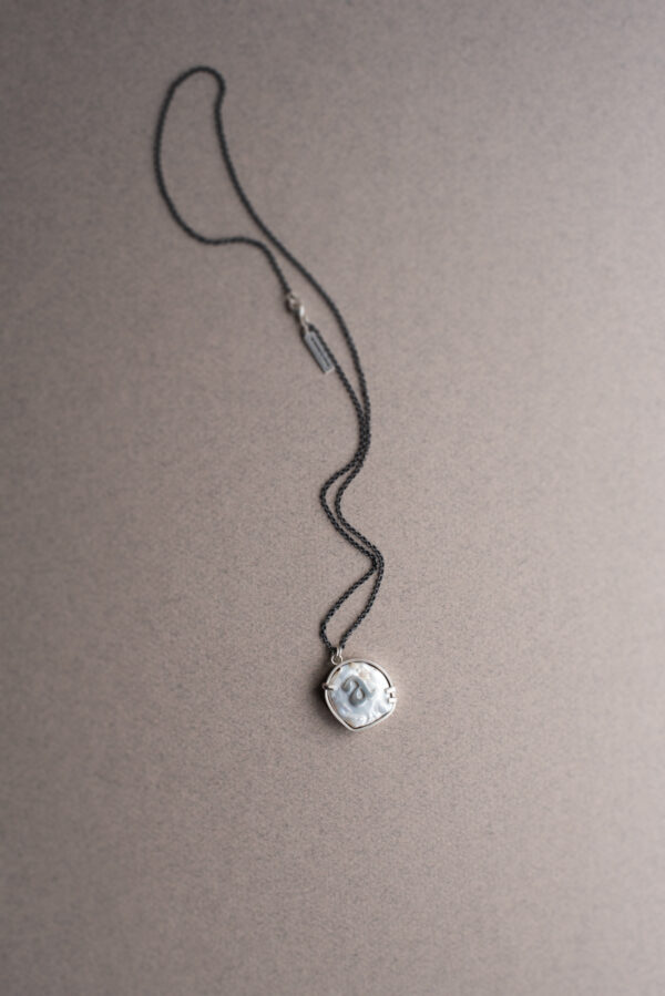 Serif on a Pearl necklaces
