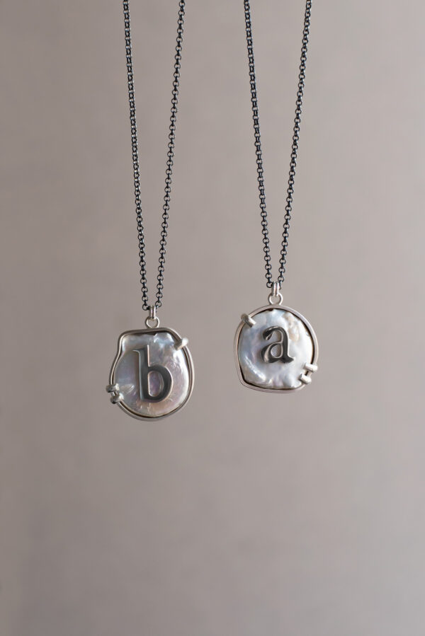 Serif on a Pearl Necklaces