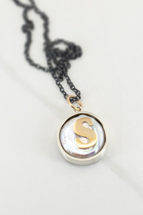 Serif on a Pearl necklace