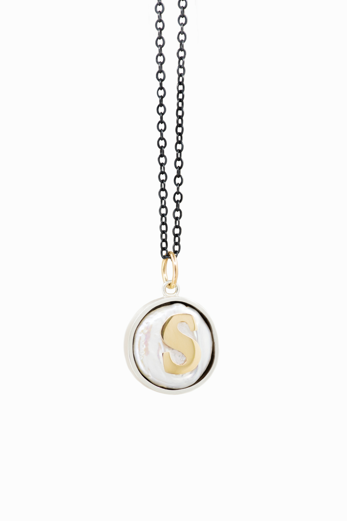 Serif on a pearl necklace