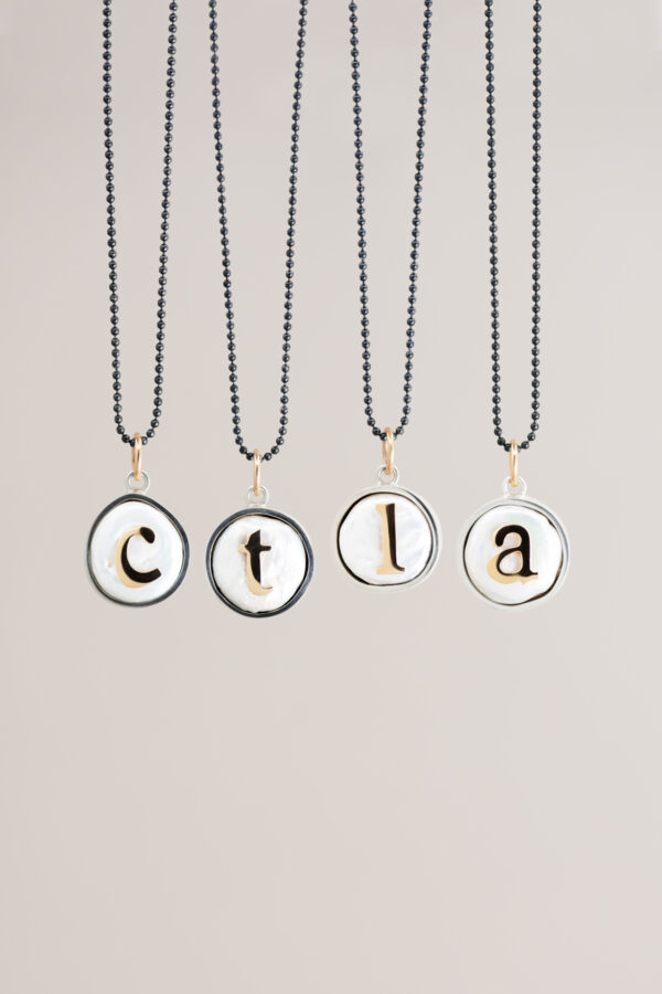 Serif on a pearl necklaces